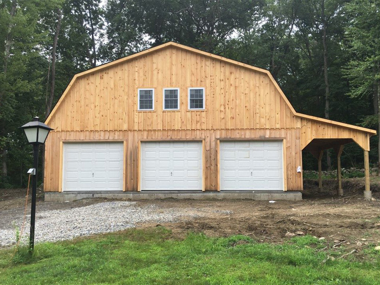 Unstained wood garage barn style