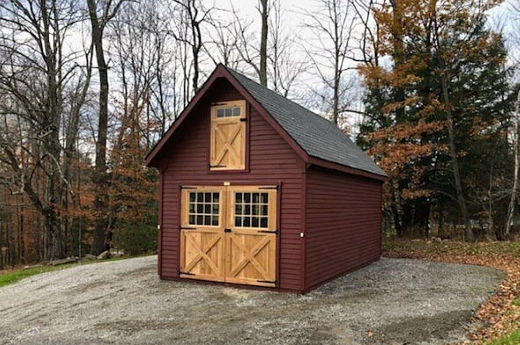 Small rustic red garage