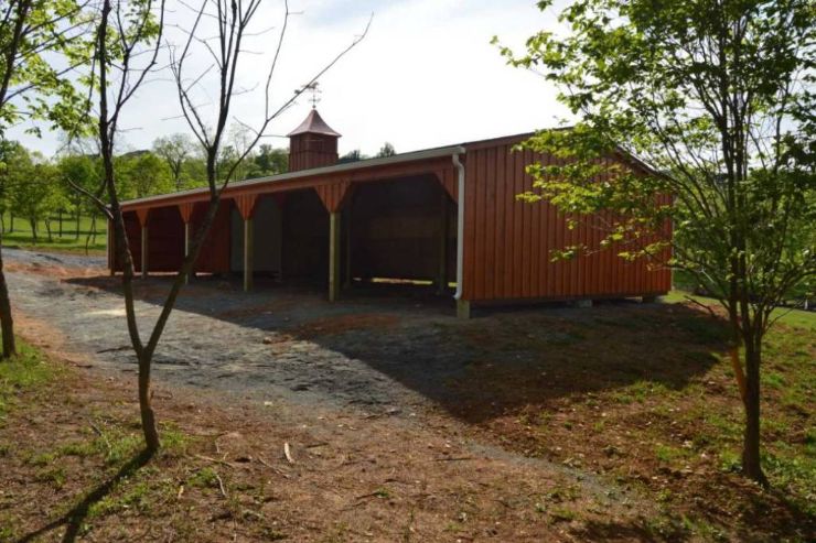 red wood loafing shed in the woods