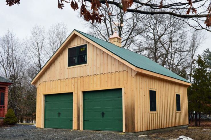 Natural garage exterior color with green roof