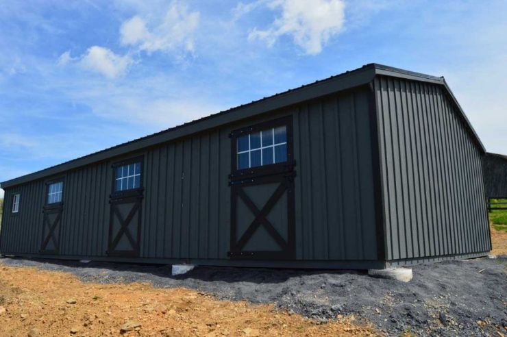 modern style black barn with three stalls