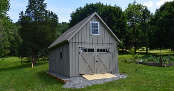 gray backyard residential shop shed next to garden