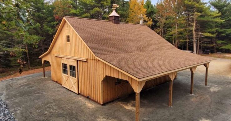 natural stained high country barn with double lean to and double front doors