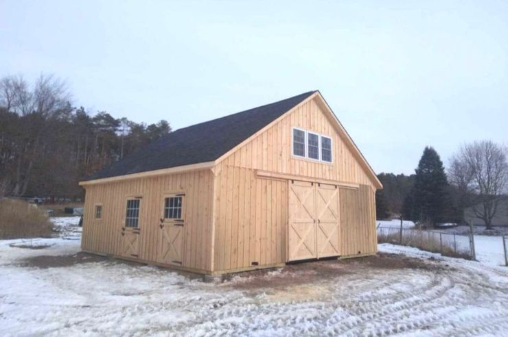 5 stall horse barn with naturally stained wood exterior