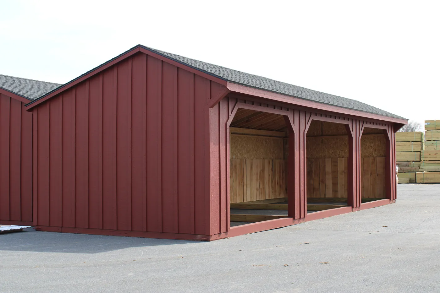 red run-in shed with charcoal shingles