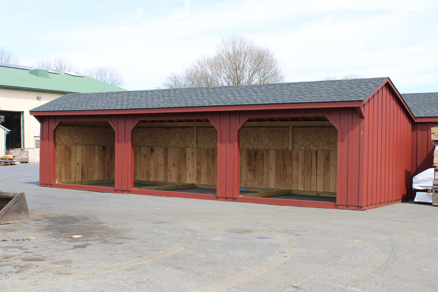 red run-in shed with charcoal shingles