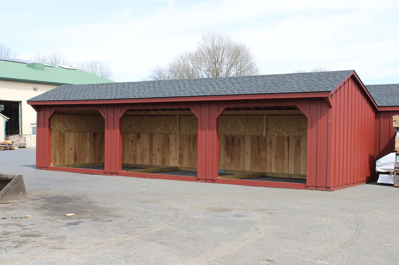 red run-in shed with charcoal shingles